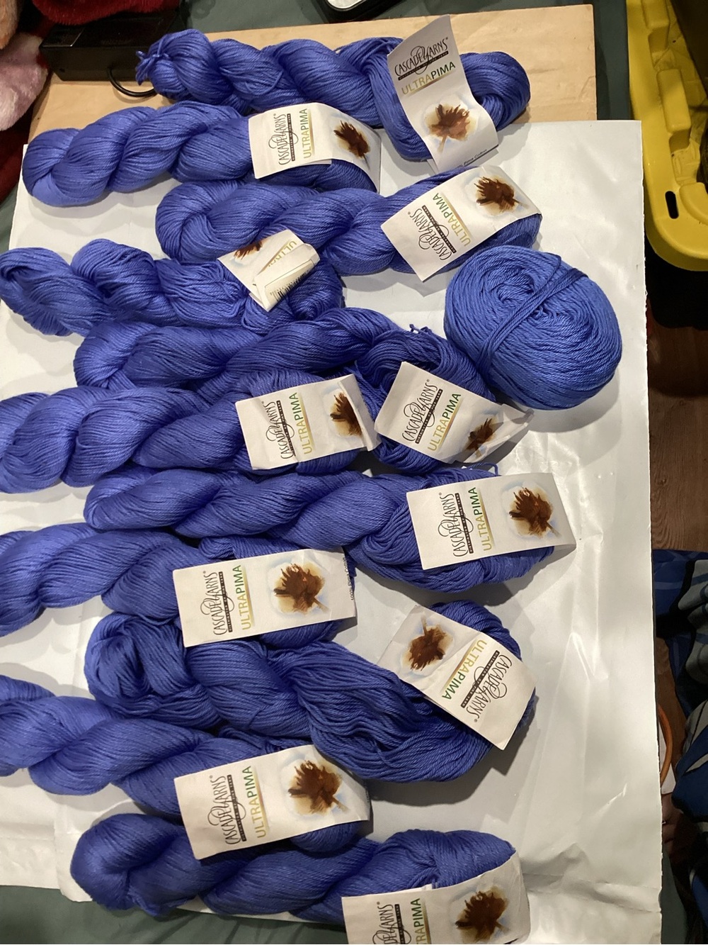 12 hanks (1 caked ) of cascade yarns ultrapima yarn in periwinkle blue